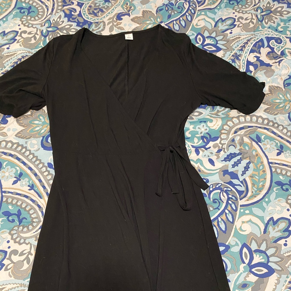 Flowy black low cut dress. Size Small.